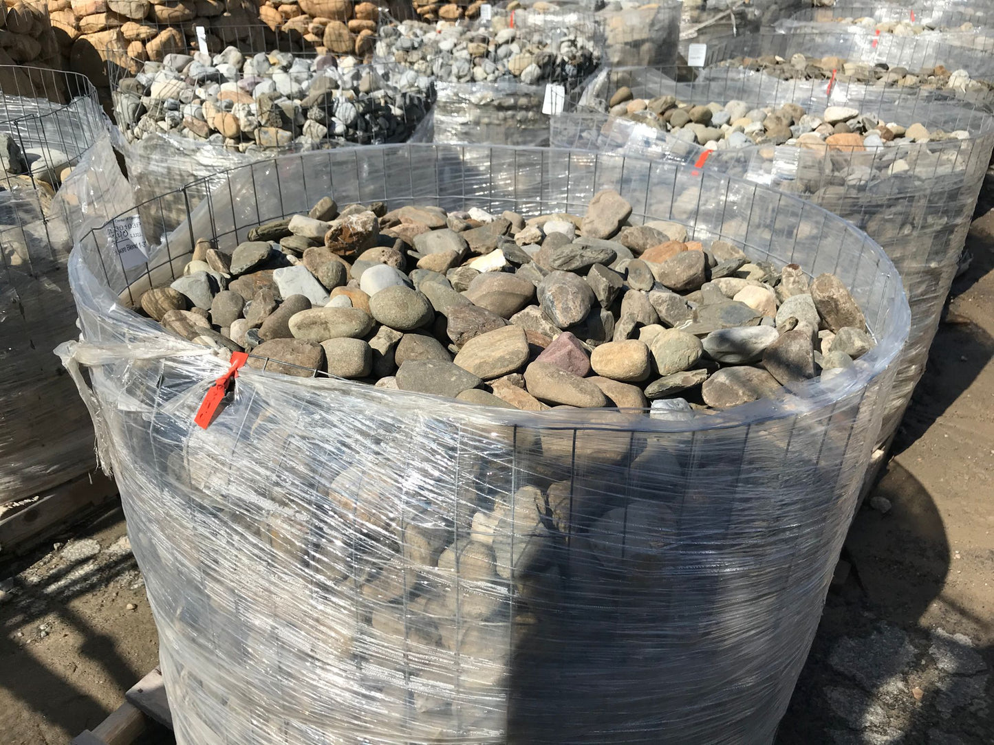 River Rock Pebbles 2″ – 4″ Installation /Hardscapes/Aggregates